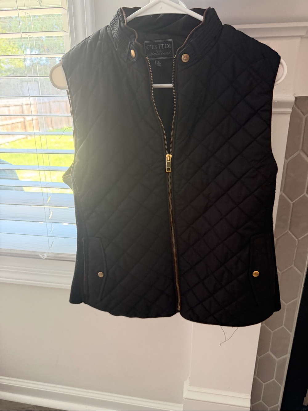 C'est Toi Black Quilted Sleeveless Vest with Gold Hardware